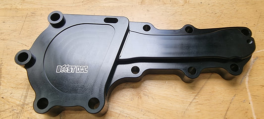 A black billet RB water pump delete plate designed for aftermarket electric water pumps