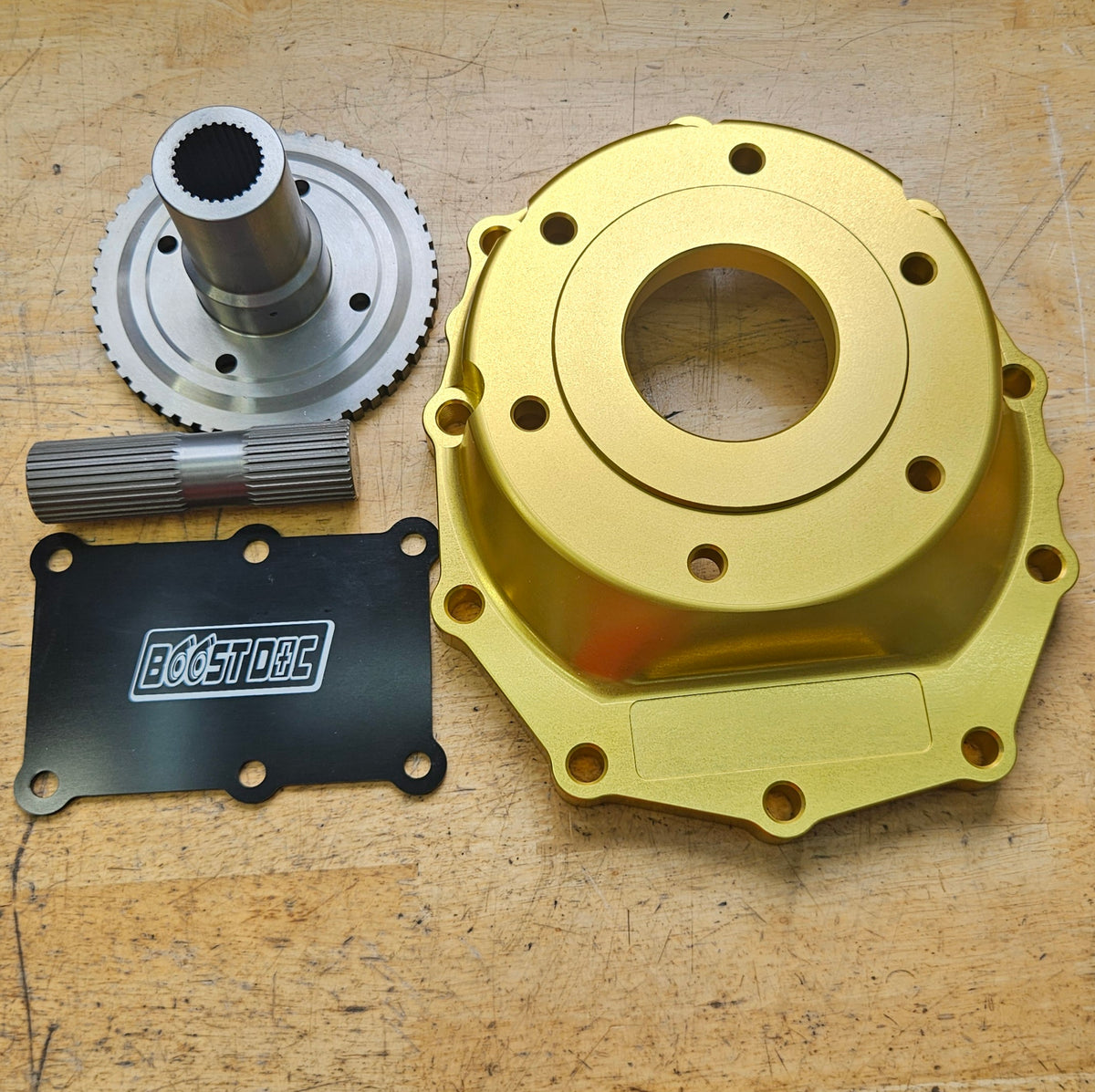 This kit adapts GTR awd transfer case to th400. fits reid and gm cases.