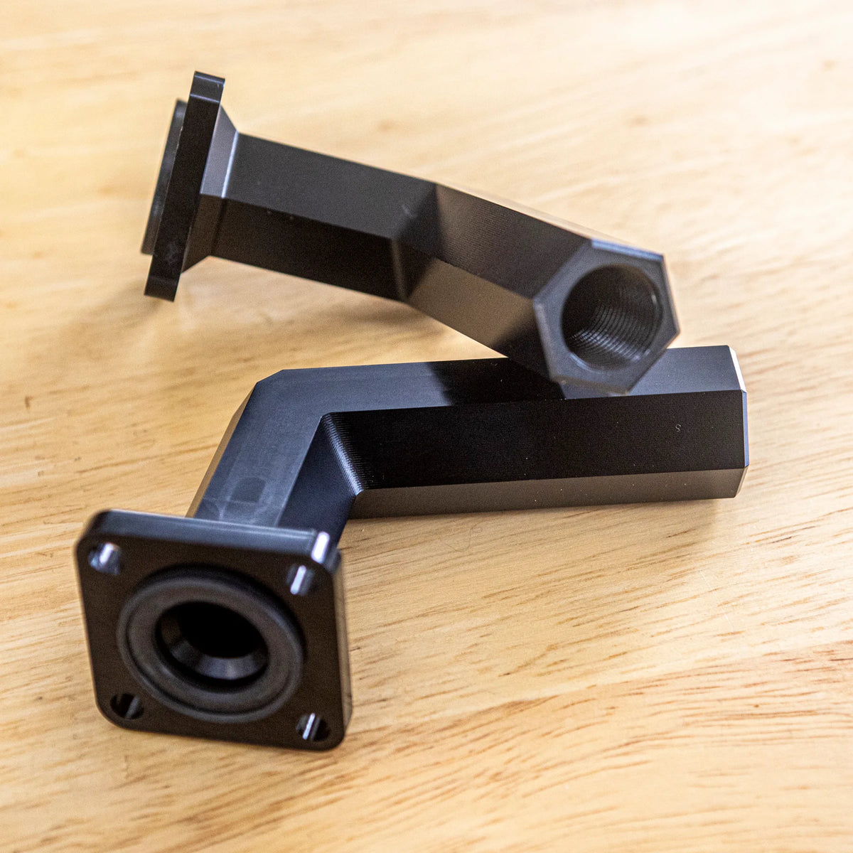 Billet heater core outlets