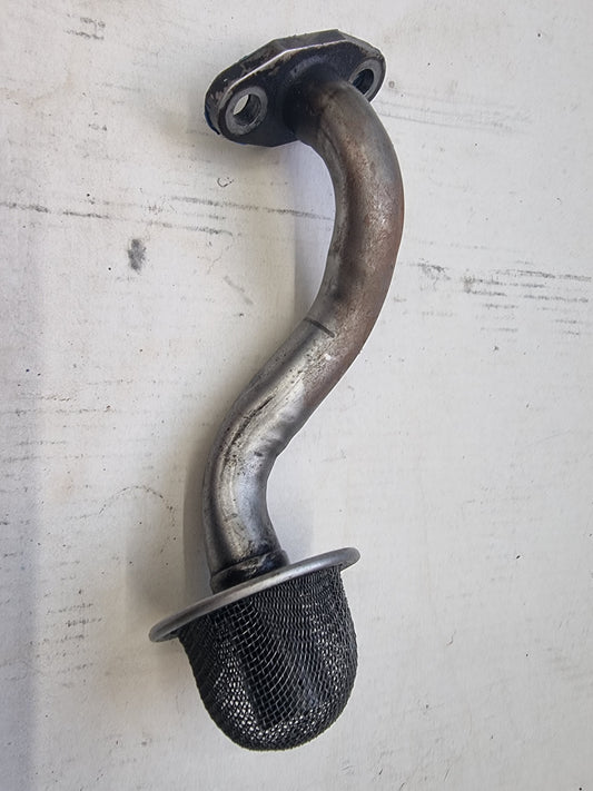 A used oil pick up tube with a metallic finish and an attached filter, intended for use with RB25, Neo, and RB30 vehicles skyline replacement parts genuine oem nissan part