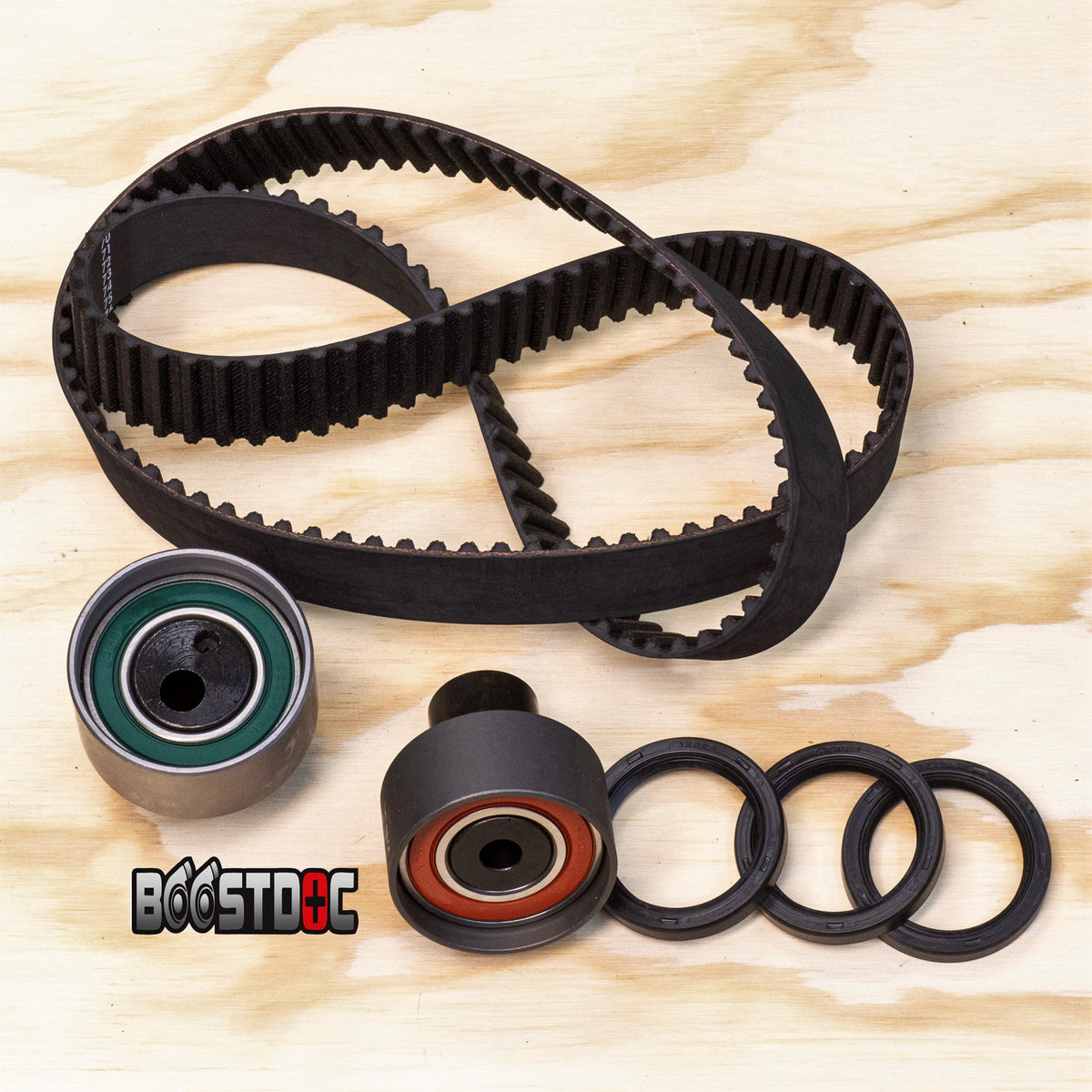 A set of RB Timing Kit components including a timing belt, tensioners, and crank & cam seals RB Timing Kit – Crank &amp; Cam Seals, Timing Belt &amp; Tensioners