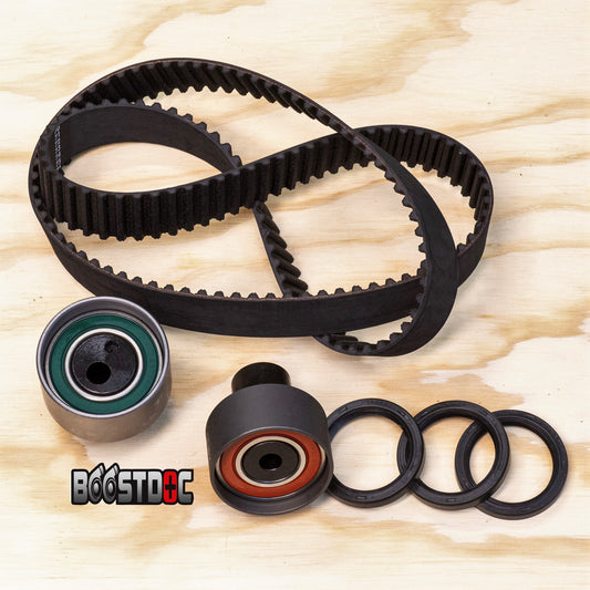 A set of RB Timing Kit components including a timing belt, tensioners, and crank & cam seals RB Timing Kit – Crank &amp; Cam Seals, Timing Belt &amp; Tensioners