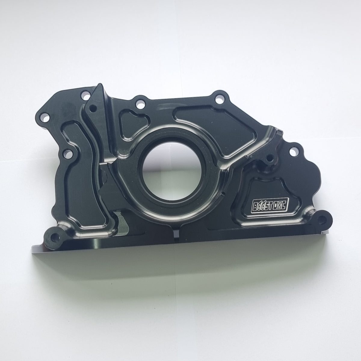 Two RB oil pump delete kits, one in black and one in silver, displayed on a white background skyline replacement parts genuine oem nissan part