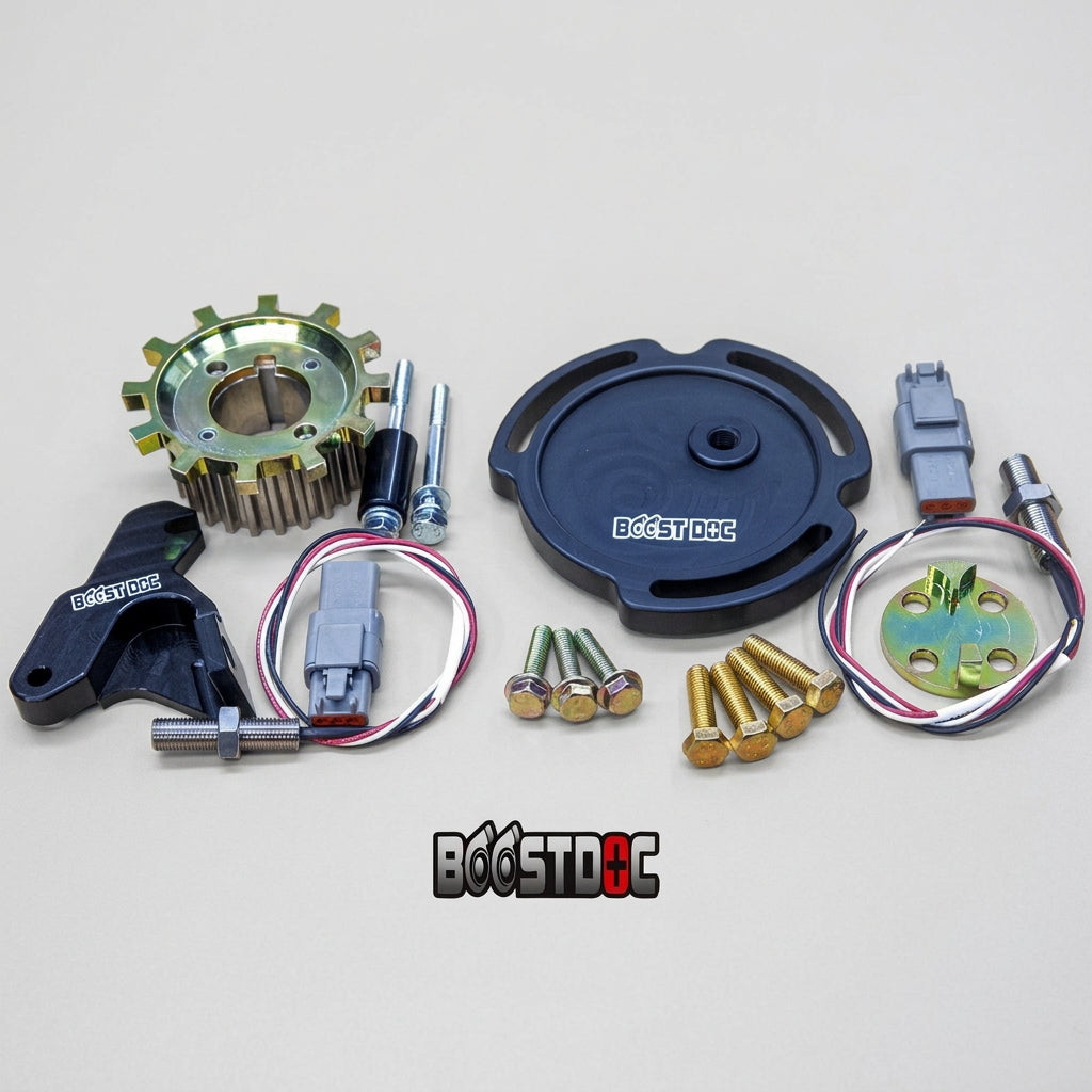 An assortment of black and metallic engine timing synchronization trigger kit components laid out on a wooden surface, including crankshaft timing gear, mounting hardware, and sensor components. skyline oem nissan parts gtr stagea safero r32 r33 r34 rb neo rb25 rb26 rb30
