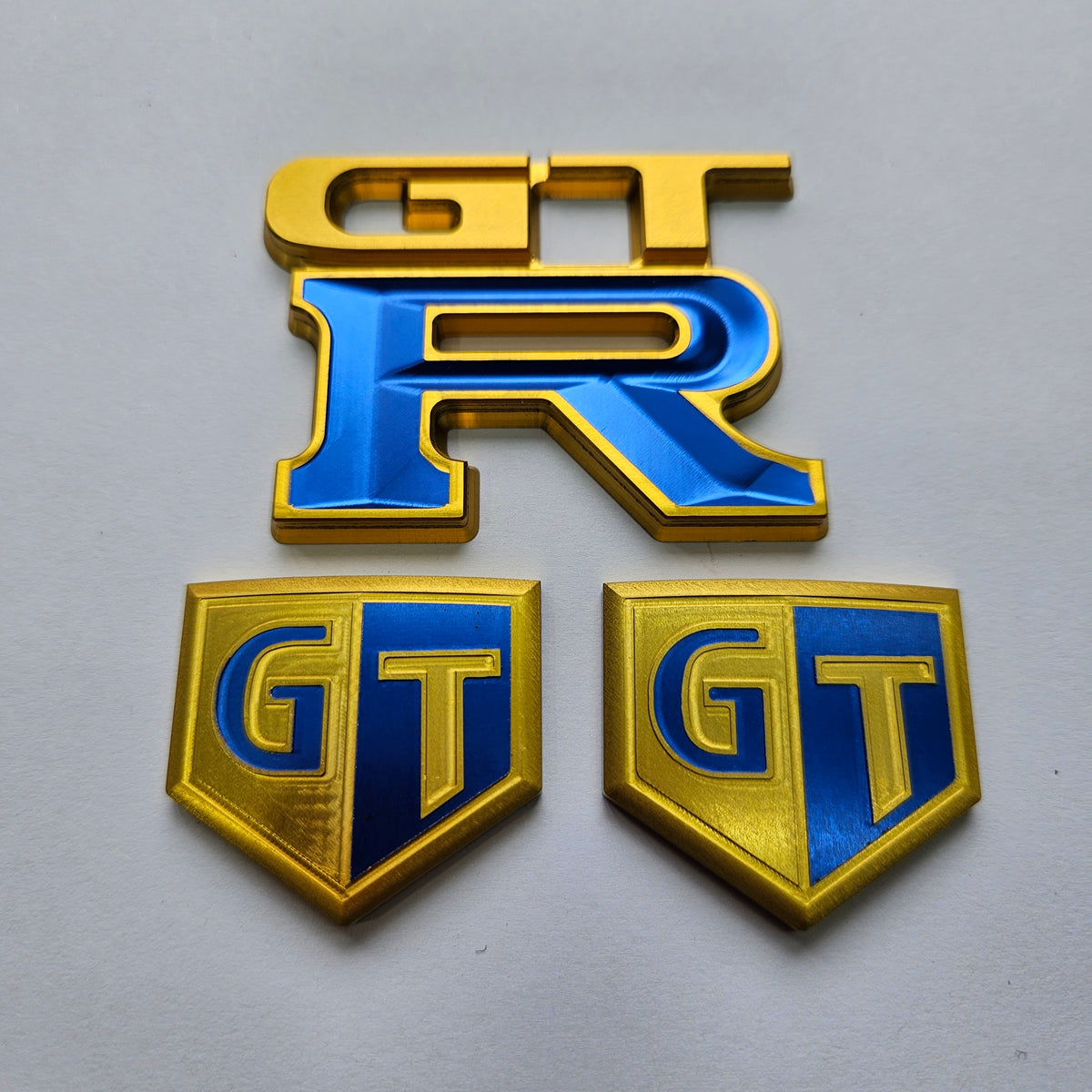 Upgrade Nissan GTR Skyline Billet and Titanium Badges gold blue
