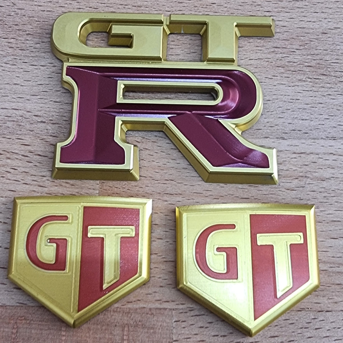 Upgrade Nissan GTR Skyline Billet and Titanium Badges gold red