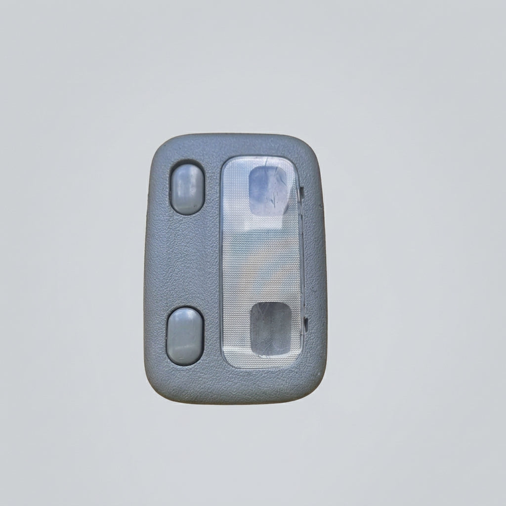 A used R33 Skyline Coupe roof light placed on a wooden surface skyline replacement parts genuine oem nissan part