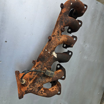 Cast Exhaust Manifold - RB25DE 14002-21U00 (Used)